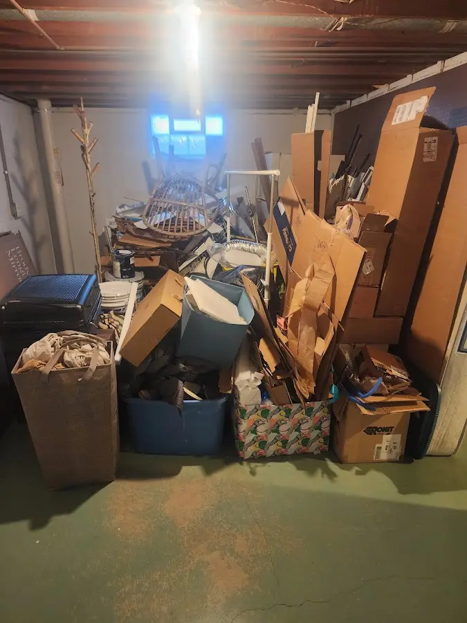 Roll-off dumpster container at job site for 8 Yard Dumpster Rental in Leland